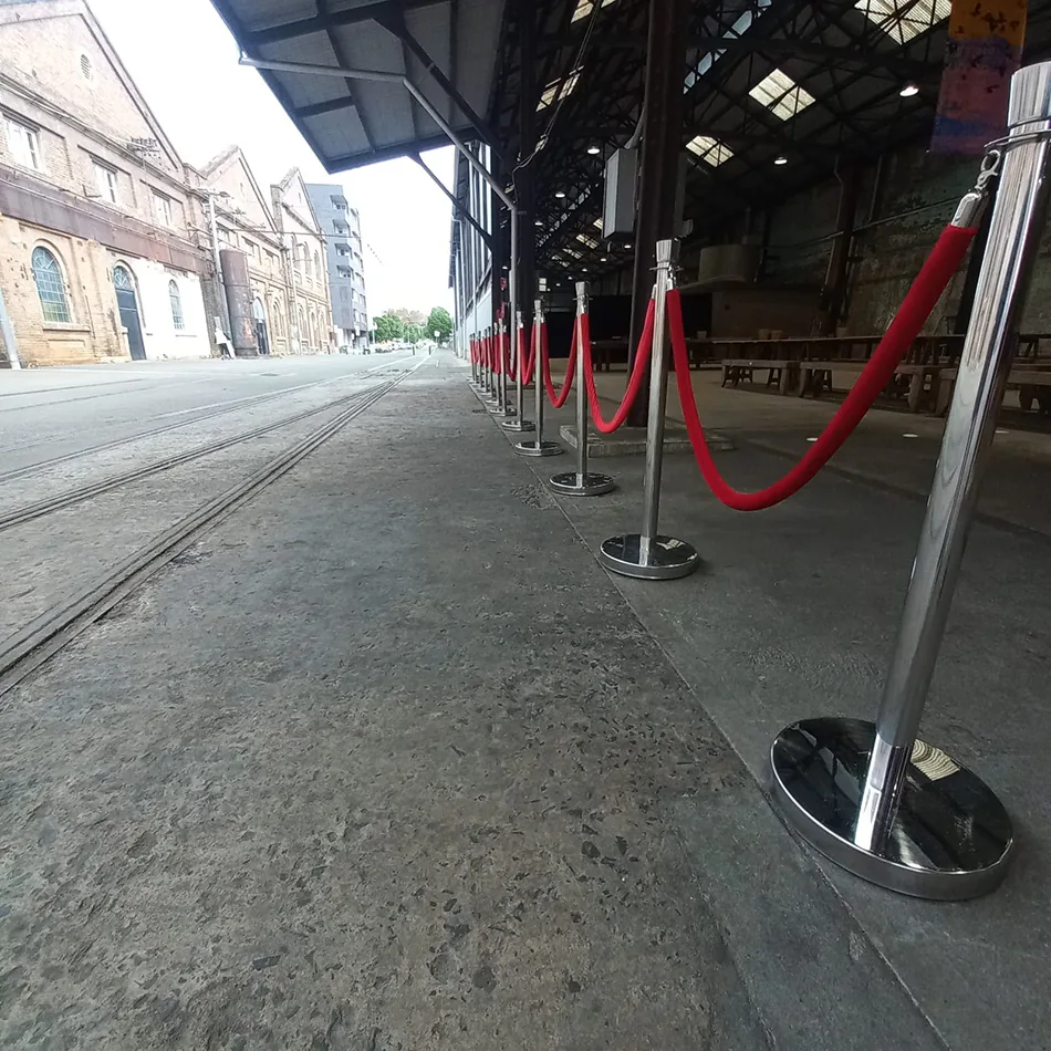 A red velvet rope hired for an outdoor event