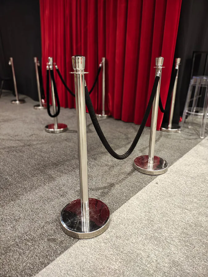 Beautiful chrome bollards with black rope