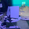 White café table set up for a paint and sip style activity with canvases, brushes, and art supplies in a themed indoor environment