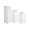 A set of three white square plinths in graduated heights, available for hire as display stands or decorative pedestals for events