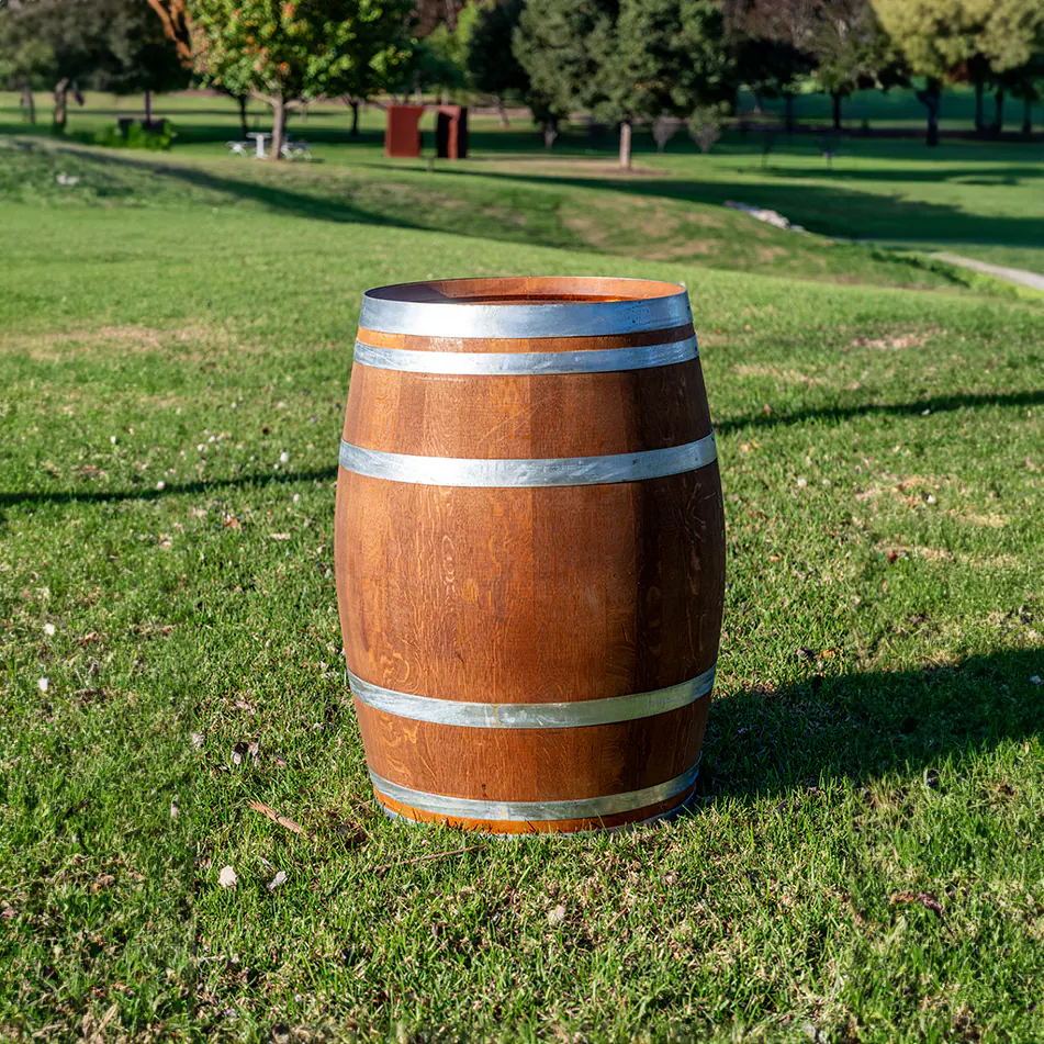 A beautiful classic wine barrel on a grass area