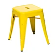 Bright yellow Tolix cafe stool in pressed steel with a square seat and tapered legs, a low 45cm stool shown against a plain background.